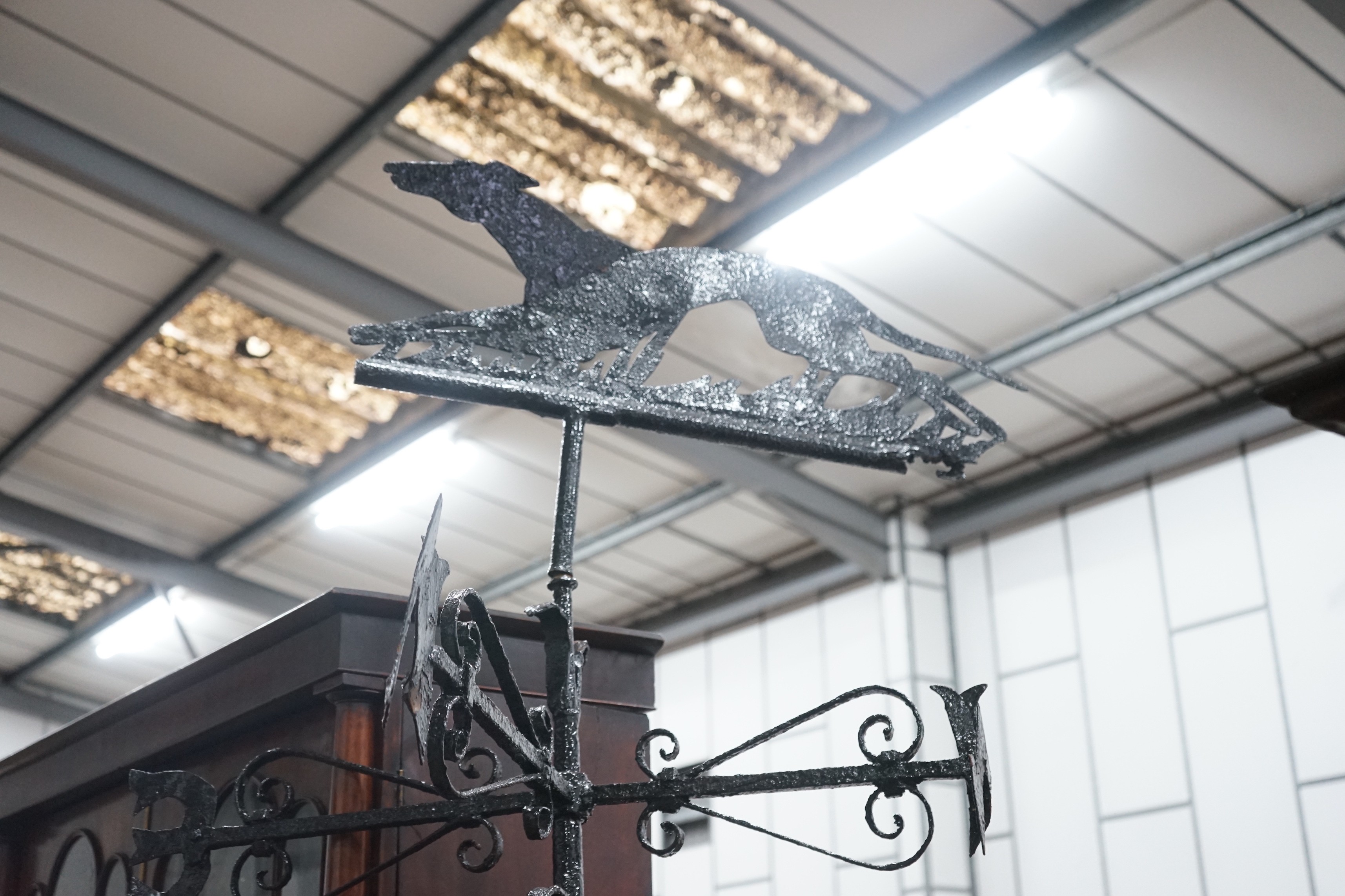 A large wrought iron weather vane, height 270cm